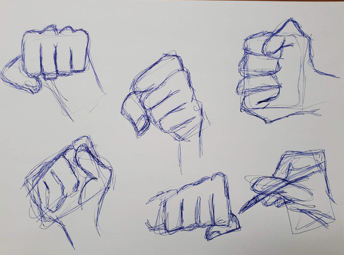 hand drawing a cartoon of something